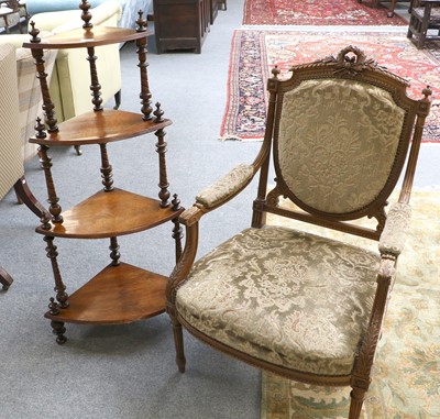 Lot 1232 - A Louis XVI style Walnut Fauteuil (Armchair),...