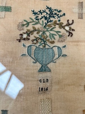 Lot 2058 - A 19th Century Darning Sampler, depicting a...