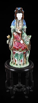 Lot 40 - ~ A Chinese Porcelain Figure of Guanyin, Qing...