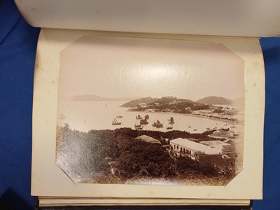 Lot 86 - Photographs. A collection of photographs in...