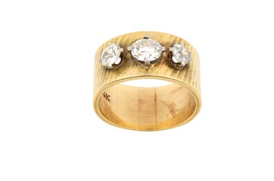 Lot 2116 - A Diamond Three Stone Ring the graduated old...