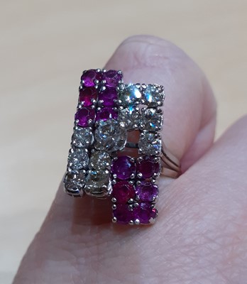 Lot 2042 - A Ruby and Diamond Cluster Ring a raised round...