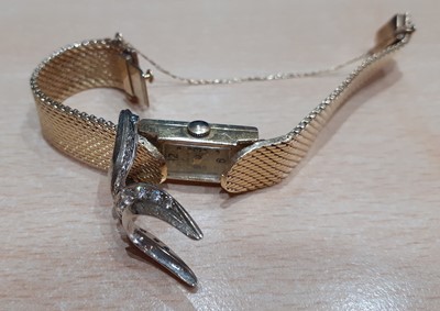 Lot 2115 - A Lady's 14 Carat Gold Diamond Set Concealed...