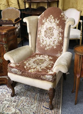 Lot 1263 - A Wing Back Chair