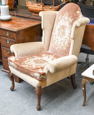 Lot 1212 - A Wing Back Chair