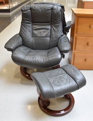 Lot 1166 - A Grey Leather Stressless Reclining Chair and...