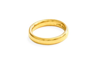 Lot 437 - A 22 Carat Gold Band Ring, finger size J1/2