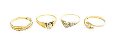 Lot 426 - A 9 Carat Gold Diamond Crossover Ring, finger...