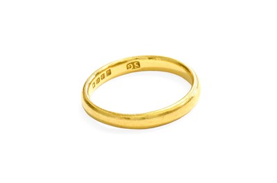 Lot 438 - A 22 Carat Gold Band Ring, finger size P