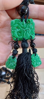 Lot 2076 - A Jade and Onyx Tassel Necklace an onyx bead...