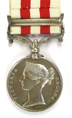 Lot 57 - An Indian Mutiny Medal 1857-59, with clasp...