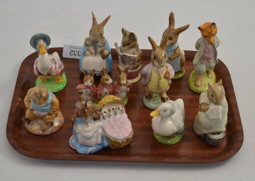 Lot 332 - Eleven Beatrix Potter china figures