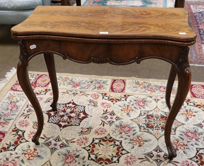 Lot 1368 - A Victorian Figured Walnut Foldover Tea Table,...