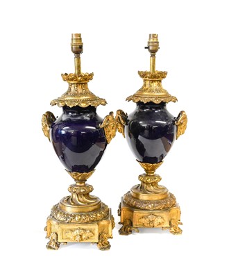 Lot 236 - A Pair of Gilt-Metal-Mounted Blue-Glazed Lamp...