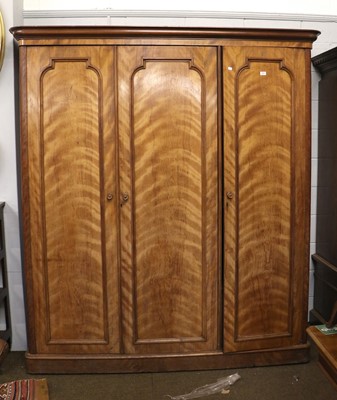 Lot 1400 - A Victorian Satinwood Triple Wardrobe, fitted...