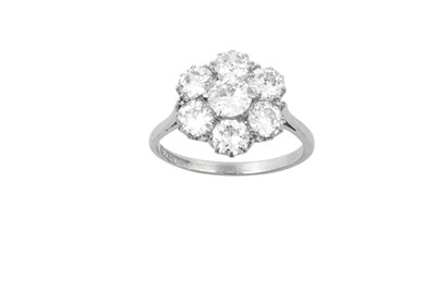 Lot 2292 - A Diamond Cluster Ring the central raised...