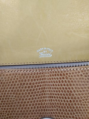 Lot 1068 - Circa 1990s Gucci Tan and Yellow Leather Cross...