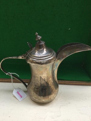 Lot 108 - Two Iraqi Silver and Niello Dallah-Style...