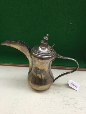 Lot 108 - Two Iraqi Silver and Niello Dallah-Style...
