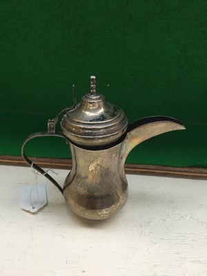 Lot 108 - Two Iraqi Silver and Niello Dallah-Style...