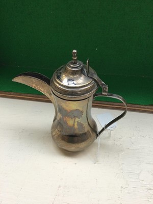Lot 108 - Two Iraqi Silver and Niello Dallah-Style...