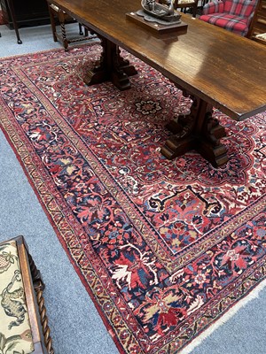 Lot 1016 - Heriz Carpet, the strawberry field centred by...