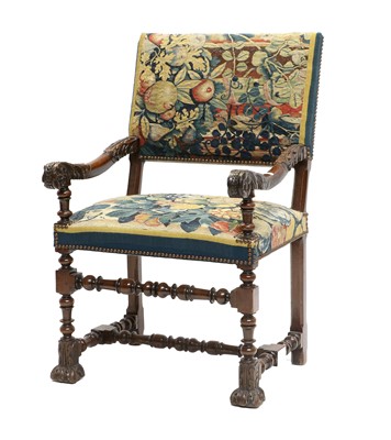 Lot 357 - A French Carved Walnut Open Armchair, covered...