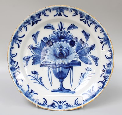 Lot 280 - A Dutch Delft Dish, circa 1750, painted in...