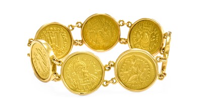 Lot 486 - A Coin Bracelet, comprising of seven later...