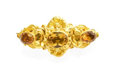 Lot 463 - A Citrine Brooch, the graduated oval cut...