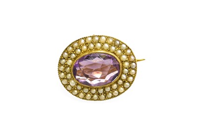 Lot 456 - An Amethyst and Split Pearl Brooch, the oval...