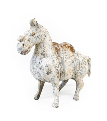 Lot 16 - A Chinese Terracotta Horse, Tang Dynasty,...