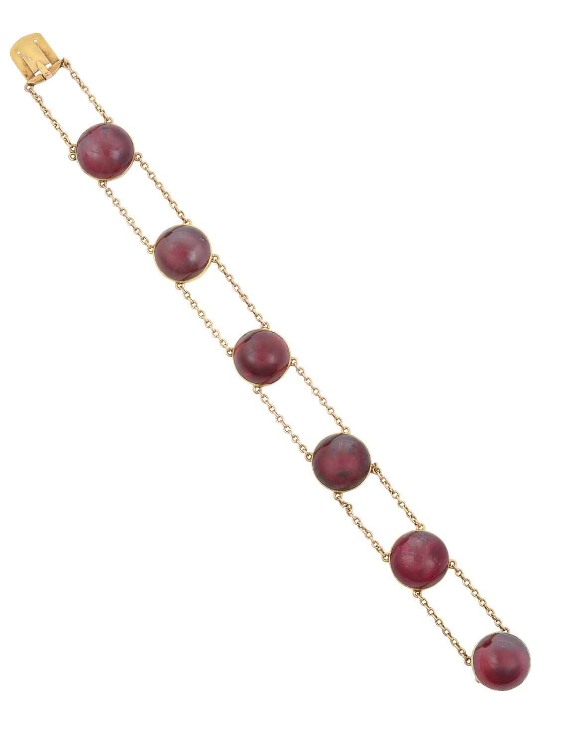 Lot 2109 - A Late 19th Century Garnet Bracelet six double...