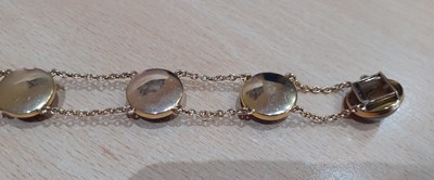 Lot 2109 - A Late 19th Century Garnet Bracelet six double...