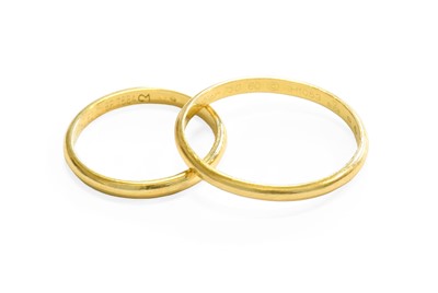 Lot 478 - Two Band Rings, by Cartier, both stamped '750',...