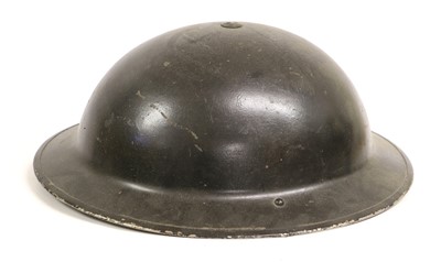 Lot 164 - A Second World War British Brodie Helmet,...