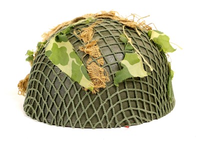 Lot 164 - A Second World War British Brodie Helmet,...