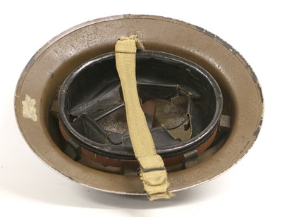 Lot 164 - A Second World War British Brodie Helmet,...