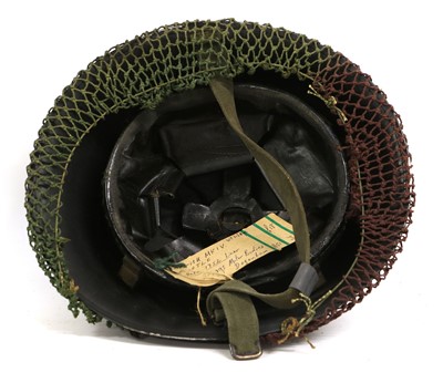Lot 164 - A Second World War British Brodie Helmet,...