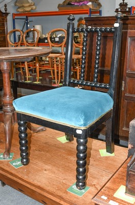 Lot 1185 - An Ebonised Bobbin Turned Chair