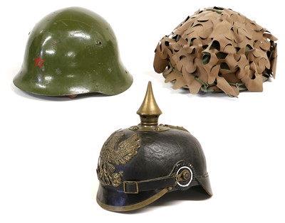 Lot 165 - A Bulgarian M36 Type C Combat Helmet, finished...