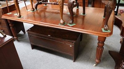 Lot 1247 - A Victorian Mahogany Wind Out Table, with two...