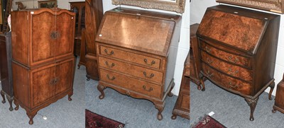 Lot 1305 - A Crossbanded Walnut Cocktail Cabinet, on...