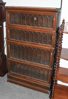 Lot 1162 - A Globe Wernicke Four Tier Oak Bookcase, 87cm...