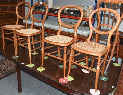 Lot 1177 - A Set of Four Caned Balloon Back Chairs