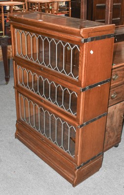 Lot 1189 - A Globe Wernicke Three Tier Oak Bookcase, 86cm...