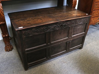 Lot 1223 - An 18th Century Carved and Panelled Oak Coffer,...