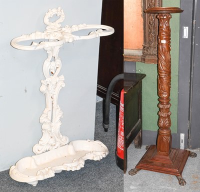 Lot 1228 - A Carved Oak Torchere, on a moulded square...