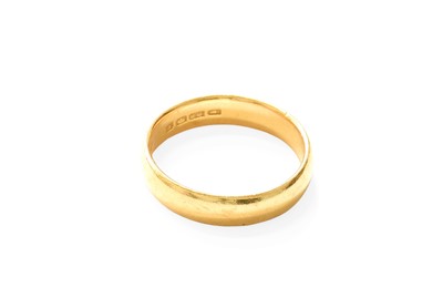 Lot 418 - A 22 Carat Gold Band Ring, finger size U1/2