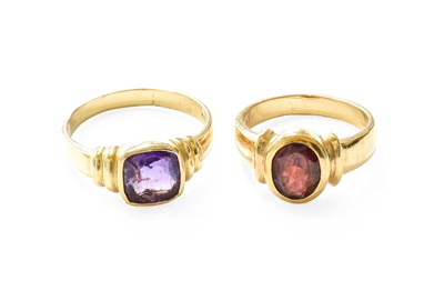 Lot 408 - A 9 Carat Gold Garnet Ring, the oval cut...